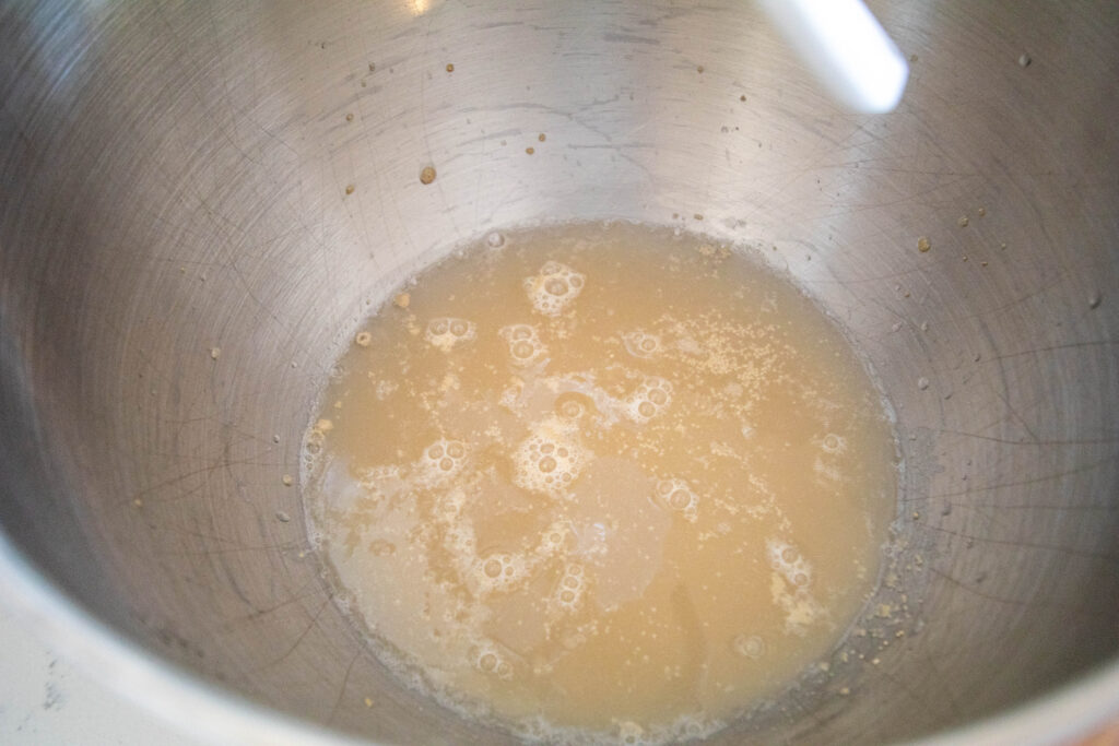 mixing bowl with water and yeast mixture