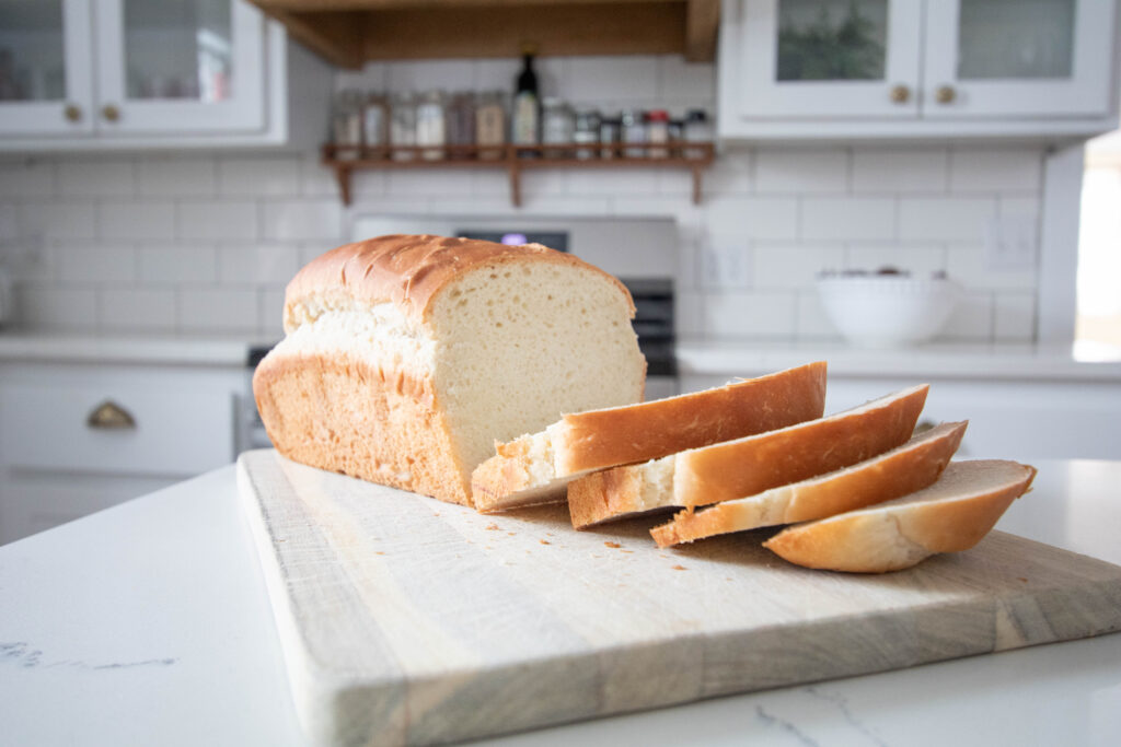 homemade sandwich bread on wooden cutting board