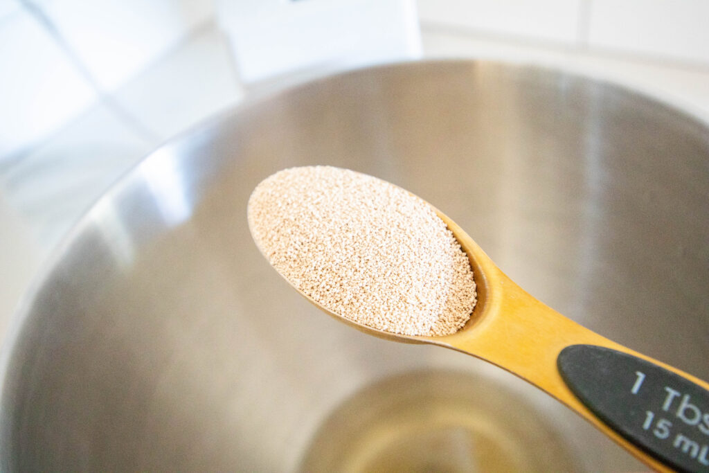 measuring spoonful of yeast