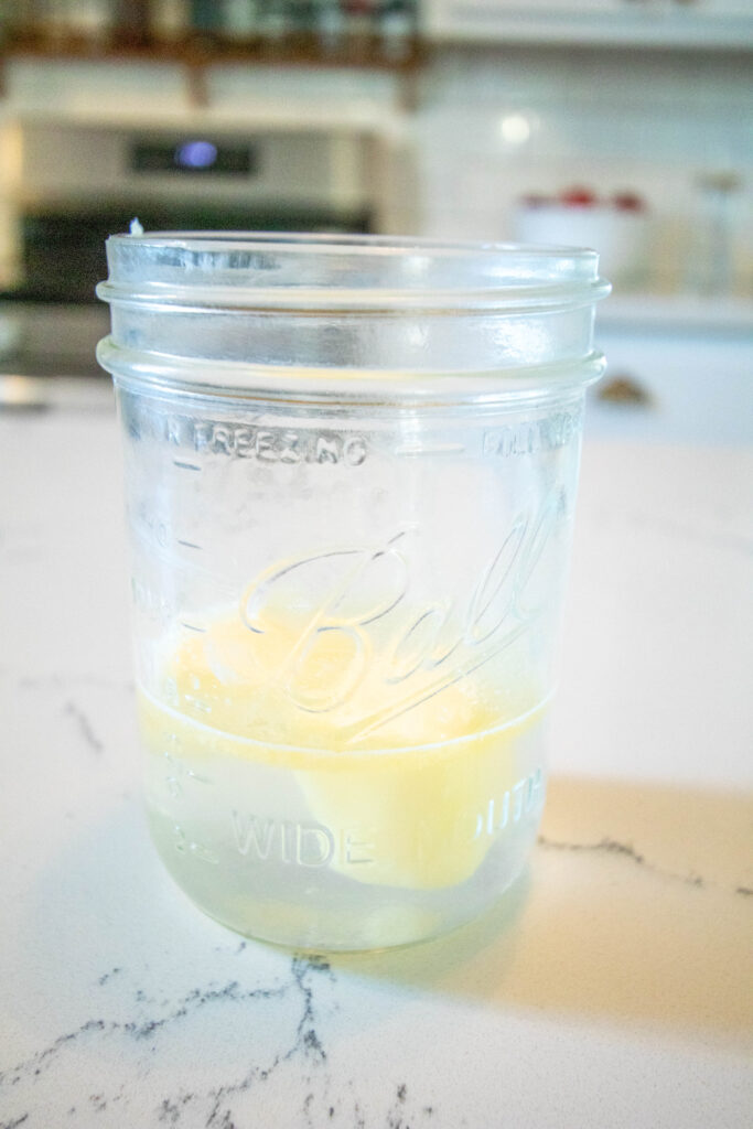 ball jar with water and butter in it